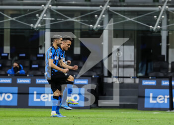 2021-04-07 - Lautaro Martínez of FC Internazionale and Achraf Hakimi of FC Internazionale celebrate during the Serie A 2020/21 football match between FC Internazionale vs US Sassuolo at the San Siro Stadium, Milan, Italy on April 07, 2021 - Photo FCI / Fabrizio Carabelli - INTER - FC INTERNAZIONALE VS US SASSUOLO - ITALIAN SERIE A - SOCCER