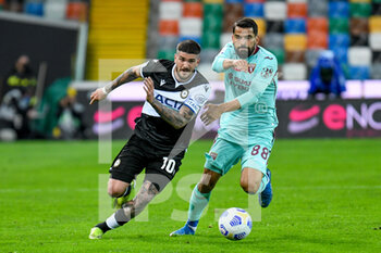 2021-04-10 - Rodrigo De Paul (Udinese) in action against Tomas Rincon (Torino) - UDINESE CALCIO VS TORINO FC - ITALIAN SERIE A - SOCCER