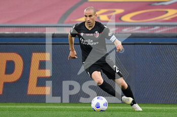 2021-04-11 - Valentin Antov of Bologna FC seen in action during the Italian Football Championship League A 2020/2021 match between AS Roma vs Bologna FC at the Olimpic Stadium in Rome. - AS ROMA VS BOLOGNA FC - ITALIAN SERIE A - SOCCER
