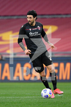 2021-04-11 - Roberto Soriano of Bologna FC seen in action during the Italian Football Championship League A 2020/2021 match between AS Roma vs Bologna FC at the Olimpic Stadium in Rome. - AS ROMA VS BOLOGNA FC - ITALIAN SERIE A - SOCCER