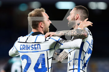 2021-04-18 - Christian Eriksen of Internazionale celebrates with Marcelo Brozovic after scoring 1-1 goal during the Italian championship Serie A football match between SSC Napoli and FC Internazionale on April 18, 2021 at Diego Armando Maradona Stadium in Naples, Italy - Photo Federico Proietti / DPPI - SSC NAPOLI VS INTER - FC INTERNAZIONALE - ITALIAN SERIE A - SOCCER