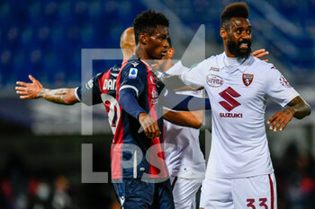 2021-04-21 - Ibrahima Mbaye (Bologna FC) and Nicolas N'Koulou (Torino FC) - BOLOGNA FC VS TORINO FC - ITALIAN SERIE A - SOCCER