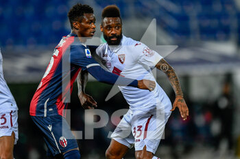 2021-04-21 - Ibrahima Mbaye (Bologna FC) and Nicolas N'Koulou (Torino FC) - BOLOGNA FC VS TORINO FC - ITALIAN SERIE A - SOCCER