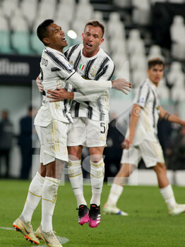 2021-04-21 - Alex Sandro Lobo Silva (Juventus FC) and Melo Arthur (Juventus FC) celebrates the goal of 1-1 - JUVENTUS FC VS PARMA CALCIO - ITALIAN SERIE A - SOCCER