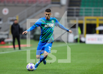 2021-04-21 - Mert Muldur of US Sassuolo in action during the Serie A 2020/21 football match between AC Milan vs US Sassuolo at Giuseppe Meazza Stadium, Milan, Italy on April 21, 2021 - Photo FCI / Fabrizio Carabelli - AC MILAN VS US SASSUOLO - ITALIAN SERIE A - SOCCER