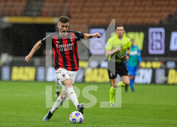 2021-04-21 - Alexis Saelemaekers of AC Milan in action during the Serie A 2020/21 football match between AC Milan vs US Sassuolo at Giuseppe Meazza Stadium, Milan, Italy on April 21, 2021 - Photo FCI / Fabrizio Carabelli - AC MILAN VS US SASSUOLO - ITALIAN SERIE A - SOCCER