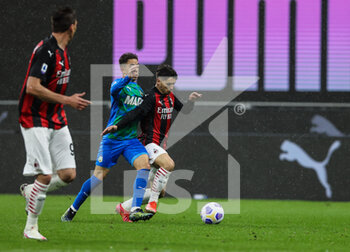 2021-04-21 - Brahim Diaz of AC Milan fights for the ball against Maxime Lopez of US Sassuolo during the Serie A 2020/21 football match between AC Milan vs US Sassuolo at Giuseppe Meazza Stadium, Milan, Italy on April 21, 2021 - Photo FCI / Fabrizio Carabelli - AC MILAN VS US SASSUOLO - ITALIAN SERIE A - SOCCER