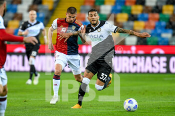 2021-04-21 - Roberto Pereyra (Udinese) in action against Razvan Marin (Cagliari) - UDINESE CALCIO VS CAGLIARI CALCIO - ITALIAN SERIE A - SOCCER