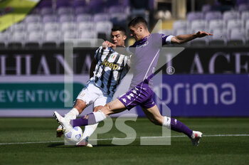 2021-04-25 - Cristiano Ronaldo of Juventus FC in action against Nikola Milenkovic of ACF Fiorentina  - ACF FIORENTINA VS JUVENTUS FC - ITALIAN SERIE A - SOCCER