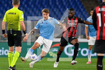 2021-04-26 - Ciro Immobile of SS Lazio and Fikayo Tomori of AC Milan seen in action during the Italian Football Championship League A 2020/2021 match between SS Lazio vs AC Milan at the Olimpic Stadium in Rome. - SS LAZIO VS AC MILAN - ITALIAN SERIE A - SOCCER