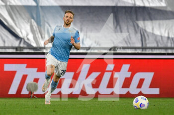 2021-04-26 - Manuel Lazzari of SS Lazio seen in action during the Italian Football Championship League A 2020/2021 match between SS Lazio vs AC Milan at the Olimpic Stadium in Rome. - SS LAZIO VS AC MILAN - ITALIAN SERIE A - SOCCER