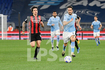 2021-04-26 - Luis Alberto of SS Lazio and Sandro Tonali of AC Milan seen in action during the Italian Football Championship League A 2020/2021 match between SS Lazio vs AC Milan at the Olimpic Stadium in Rome. - SS LAZIO VS AC MILAN - ITALIAN SERIE A - SOCCER