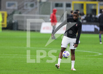2021-05-01 - Pierre Kalulu of AC Milan warms up during the Serie A 2020/21 football match between AC Milan vs Benevento Calcio at Giuseppe Meazza Stadium, Milan, Italy on May 01, 2021 - Photo FCI / Fabrizio Carabelli - AC MILAN VS BENEVENTO CALCIO - ITALIAN SERIE A - SOCCER