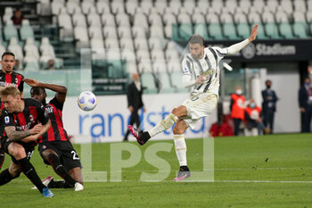 2021-05-09 - Rodrigo Bentancur (Juventus FC) shoots the ball - JUVENTUS FC VS AC MILAN - ITALIAN SERIE A - SOCCER