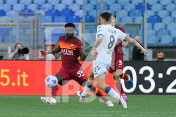 2021-05-09 - Ebrima Darboe of AS Roma and Luca Cigarini (FC Crotone) seen in action during the Italian Football Championship League A 2020/2021 match between AS Roma vs FC Crotone at the Olimpic Stadium in Rome. - AS ROMA VS FC CROTONE - ITALIAN SERIE A - SOCCER