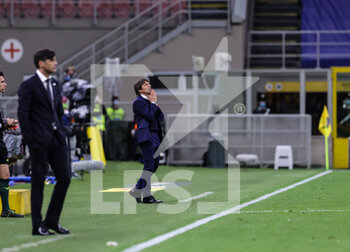 2021-05-12 - Head Coach of FC Internazionale Antonio Conte reacts from the bench during the Serie A 2020/21 football match between FC Internazionale and AS Roma at Giuseppe Meazza Stadium, Milan, Italy on May 12, 2021 - Photo FCI / Fabrizio Carabelli - INTER - FC INTERNAZIONALE VS AS ROMA - ITALIAN SERIE A - SOCCER