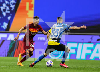 2021-05-12 - Stephan El Shaarawy of AS Roma fights for the ball against Danilo D'Ambrosio of FC Internazionale during the Serie A 2020/21 football match between FC Internazionale and AS Roma at Giuseppe Meazza Stadium, Milan, Italy on May 12, 2021 - Photo FCI / Fabrizio Carabelli - INTER - FC INTERNAZIONALE VS AS ROMA - ITALIAN SERIE A - SOCCER