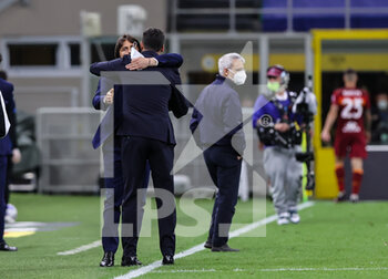 2021-05-12 - Head Coach of FC Internazionale Antonio Conte and Head Coach of AS Roma Paulo Fonseca during the Serie A 2020/21 football match between FC Internazionale and AS Roma at Giuseppe Meazza Stadium, Milan, Italy on May 12, 2021 - Photo FCI / Fabrizio Carabelli - INTER - FC INTERNAZIONALE VS AS ROMA - ITALIAN SERIE A - SOCCER