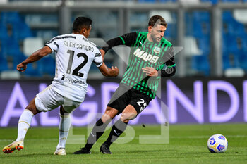 2021-05-12 - Domenico Berardi (US Sassuolo) and Alex Sandro (Juventus FC) - US SASSUOLO VS JUVENTUS FC - ITALIAN SERIE A - SOCCER