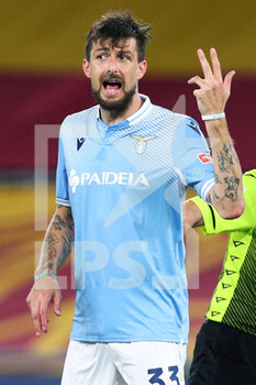 2021-05-15 - Francesco Acerbi of Lazio reacts during the Italian championship Serie A football match between AS Roma and SS Lazio on May 15, 2021 at Stadio Olimpico in Rome, Italy - Photo Federico Proietti / DPPI - AS ROMA VS SS LAZIO - ITALIAN SERIE A - SOCCER