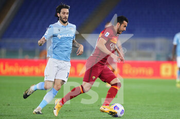 2021-05-15 - Pedro Rodriguez of Roma (R) vies for the ball with Luis Alberto of Lazio (L) during the Italian championship Serie A football match between AS Roma and SS Lazio on May 15, 2021 at Stadio Olimpico in Rome, Italy - Photo Federico Proietti / DPPI - AS ROMA VS SS LAZIO - ITALIAN SERIE A - SOCCER