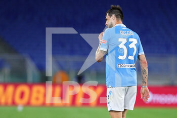 2021-05-15 - Francesco Acerbi of Lazio leaves the pitch after receiving a red card during the Italian championship Serie A football match between AS Roma and SS Lazio on May 15, 2021 at Stadio Olimpico in Rome, Italy - Photo Federico Proietti / DPPI - AS ROMA VS SS LAZIO - ITALIAN SERIE A - SOCCER