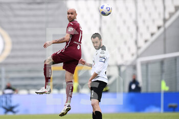 2021-05-15 - Simone Zaza (Torino FC) in action against Claudio Terzi (Spezia Calcio) - SPEZIA CALCIO VS TORINO FC - ITALIAN SERIE A - SOCCER