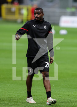 2021-05-16 - Pierre Kalulu of AC Milan warms up during the Serie A 2020/21 football match between AC Milan vs Cagliari Calcio at Giuseppe Meazza Stadium, Milan, Italy on May 16, 2021 - Photo FCI / Fabrizio Carabelli - AC MILAN VS CAGLIARI CALCIO - ITALIAN SERIE A - SOCCER