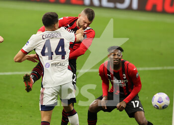 2021-05-16 - Ante Rebic of AC Milan fights for the ball against Andrea Carboni of Cagliari Calcio during the Serie A 2020/21 football match between AC Milan vs Cagliari Calcio at Giuseppe Meazza Stadium, Milan, Italy on May 16, 2021 - Photo FCI / Fabrizio Carabelli - AC MILAN VS CAGLIARI CALCIO - ITALIAN SERIE A - SOCCER
