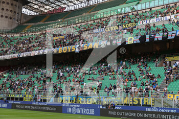2021-08-21 - Fans maintaining social distancing attend during the Serie A 2021/22 football match between FC Internazionale and Genoa CFC at Giuseppe Meazza Stadium, Milan, Italy on August 21, 2021 - Photo FCI / Fabrizio Carabelli - INTER - FC INTERNAZIONALE VS GENOA CFC - ITALIAN SERIE A - SOCCER