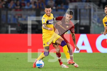 2021-08-22 - Cristiano Biraghi of ACF Fiorentina and Lorenzo Pellegrini of AS Roma seen in action during the  Italian Football Championship League A 2021/2022 match between AS Roma vs ACF Fiorentina at the Olimpic Stadium in Rome. - AS ROMA VS ACF FIORENTINA - ITALIAN SERIE A - SOCCER