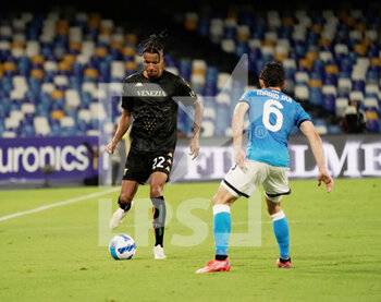 2021-08-22 - Mario Rui of Napoli in and Tyronne Ebuehi of Venezia action during the match Serie A TIM between SSC Napoli Vs Venezia FC on August 22, 2021 in Naples at the Stadio Diego Armando Maradona.
 - SSC NAPOLI VS VENEZIA FC - ITALIAN SERIE A - SOCCER