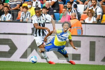 2021-08-22 - Foul of Destiny Udogie (Udinese) on Juan Cuadrado (Juventus) - UDINESE CALCIO VS JUVENTUS FC - ITALIAN SERIE A - SOCCER