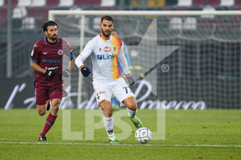 2020-12-30 - Panagiotis Tachtsidis (Lecce) carries the ball followed by Manuel Iori (Cittadella) - AS CITTADELLA VS US LECCE - ITALIAN SERIE B - SOCCER