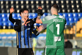 2021-01-16 - Andrea Meroni (Pisa) celebrates with Simone Perilli (Pisa) at the end of the match - PISA SC VS BRESCIA CALCIO - ITALIAN SERIE B - SOCCER