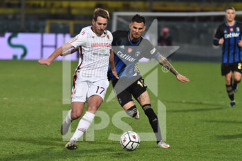 2021-01-30 - Lorenzo Libutti (Reggiana) and Marius Marin (Pisa) fight for the ball - AC PISA VS AC REGGIANA - ITALIAN SERIE B - SOCCER