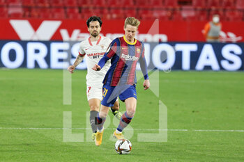 2021-02-10 - Frenkie de Jong of FC Barcelona and Suso of FC Sevilla during the Spanish Cup, Copa del Rey, semi final, 1st leg football match between FC Sevilla and FC Barcelona on February 10, 2021 at Sanchez Pizjuan stadium in Sevilla, Spain - Photo Laurent Lairys / DPPI - SEMI FINAL - FC SEVILLA AND FC BARCELONA - SPANISH CUP - SOCCER