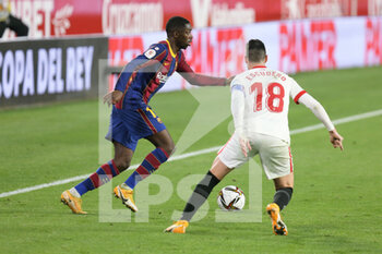 2021-02-10 - Ousmane Dembele of FC Barcelona and Sergio Escudero of FC Sevilla during the Spanish Cup, Copa del Rey, semi final, 1st leg football match between FC Sevilla and FC Barcelona on February 10, 2021 at Sanchez Pizjuan stadium in Sevilla, Spain - Photo Laurent Lairys / DPPI - SEMI FINAL - FC SEVILLA AND FC BARCELONA - SPANISH CUP - SOCCER