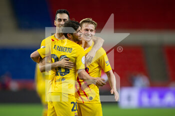 2021-04-17 - Sergi Roberto, Sergio Busquets and Frenkie de Jong of Barcelona celebrate at the final whistle during the Spanish Cup, Copa Del Rey, Final football match between Athletic Club and FC Barcelona on April 17, 2021 at Estadio de La Cartuja in Seville, Spain - Photo Joaquin Corchero / Spain DPPI / DPPI - FINAL - ATHLETIC CLUB VS FC BARCELONA - SPANISH CUP - SOCCER