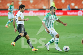 2020-10-03 - Goncalo Guedes of Valencia CF and Nabil Fekir of Real Betis during the Spanish championship La Liga football mach between Valencia and Real Betis on October 3, 2020 at Mestalla stadium in Valencia, Spain - Photo Maria Jose Segovia / Spain DPPI / DPPI - VALENCIA VS REAL BETIS - SPANISH LA LIGA - SOCCER