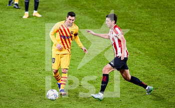 2021-01-06 - Lionel Messi of FC Barcelona and Mikel Vesga of Athletic Club during the Spanish championship La Liga football match between Athletic Club and FC Barcelona on January 6, 2021 at San Mames stadium in Bilbao, Spain - Photo Inigo Larreina / Spain DPPI / DPPI - ATHLETIC CLUB VS FC BARCELONA - SPANISH LA LIGA - SOCCER