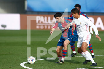 2021-01-30 - Gonzalo Melero of Levante and Raphael Varane of Real Madrid in action during the Spanish championship La Liga football match between Real Madrid and Levante UD on january 30, 2021 at Ciudad Deportiva Real Madrid in Valdebebas near Madrid, Spain - Photo Oscar J Barroso / Spain DPPI / DPPI - REAL MADRID AND LEVANTE UD - SPANISH LA LIGA - SOCCER