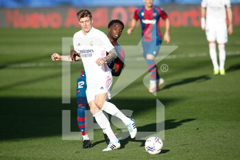 2021-01-30 - Toni Kroos of Real Madrid and Michael Malsa of Levante in action during the spanish league, La Liga Santander, football match played between Real Madrid and Levante UD at Ciudad Deportiva Real Madrid on january 30, 2021, in Valdebebas, Madrid, Spain. - REAL MADRID AND LEVANTE UD - SPANISH LA LIGA - SOCCER