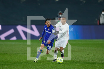 2021-02-09 - Takefusa Kubo of Getafe and Carlos Henrique Casemiro of Real Madrid in action during the Spanish championship La Liga football match between Real Madrid and Getafe CF on february 9, 2021 at Ciudad Deportiva Real Madrid in Valdebebas near Madrid, Spain - Photo Oscar J Barroso / Spain DPPI / DPPI - REAL MADRID AND GETAFE CF - SPANISH LA LIGA - SOCCER