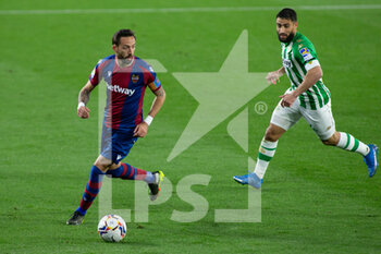 2021-03-19 - Jose Luis Morales of Levante and Nabil Fekir of Real Betis during the Spanish championship La Liga football match between Real Betis Balompie and Levante Union Deportiva on March 19, 2021 at Benito Villamarin Stadium in Sevilla, Spain - Photo Joaquin Corchero / Spain DPPI / DPPI - REAL BETIS BALOMPIE AND LEVANTE UNION DEPORTIVA - SPANISH LA LIGA - SOCCER