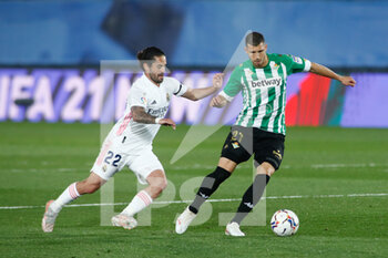 2021-04-24 - Guido Rodriguez of Real Betis and Francisco "Isco" Alarcon of Real Madrid during the Spanish championship La Liga football match between Real Madrid and Real Betis on April 24, 2021 at Ciudad Deportiva Real Madrid in Valdebebas, Madrid, Spain - Photo Oscar J Barroso / Spain DPPI / DPPI - REAL MADRID VS REAL BETIS - SPANISH LA LIGA - SOCCER