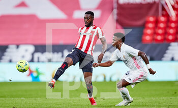 2021-05-16 - Inaki Williams of Athletic Club and Vinicius Junior of Real Madrid during the Spanish championship La Liga football match between Athletic Club and Real Madrid CF on May 16, 2021 at San Mames stadium in Bilbao, Spain - Photo Inigo Larreina / Spain DPPI / DPPI - ATHLETIC CLUB VS REAL MADRID CF - SPANISH LA LIGA - SOCCER