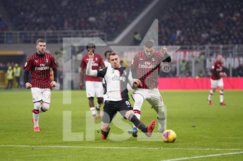 2020-02-13 - Theo Hernandez (Milan) e Aaron Ramsey (Juventus) - MILAN VS JUVENTUS - ITALIAN CUP - SOCCER