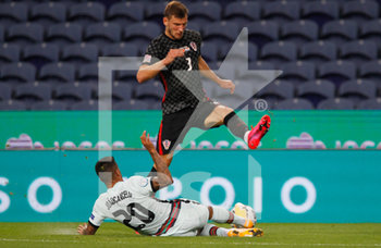 2020-09-05 - Joao Cancelo of Portugal in action with Borna Barisic of Croatia during the UEFA Nations League Group A3 football match between Portugal and Croatia on September 5, 2020 at the Estadio do Dragao in Porto, Portugal - Photo Nuno Guimaraes / ProSportsImages / DPPI - PORTOGALLO VS CROAZIA - UEFA NATIONS LEAGUE - SOCCER