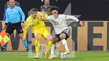 2020-11-15 - Leroy Sane of Germany and Eduard Sobol of Uktaine during the UEFA Nations League, qualifying football match between Germany and Uktaine on November 14, 2020 at Red Bull Arena in Leipzig, Germany - Photo Ralf Ibing / firo Sportphoto / DPPI - GERMANY VS UKRAINE - UEFA NATIONS LEAGUE - SOCCER
